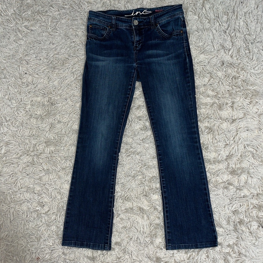 Boot cut or flare low rise dark blue/navy jeans/pants size P4.
